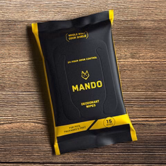 Mando wipes on a wood surface