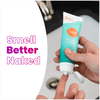Person applying Lume minted cucumber scented cream deodorant to their left hand and text that says: Smell better naked