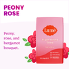 Pink Lume peony rose scented soap bar over two pink roses and the text: Peony rose, peony rose and bergamot bouquet