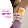 Bright orange Lume toasted coconut scented deodorant stick and text that says: Smell better naked